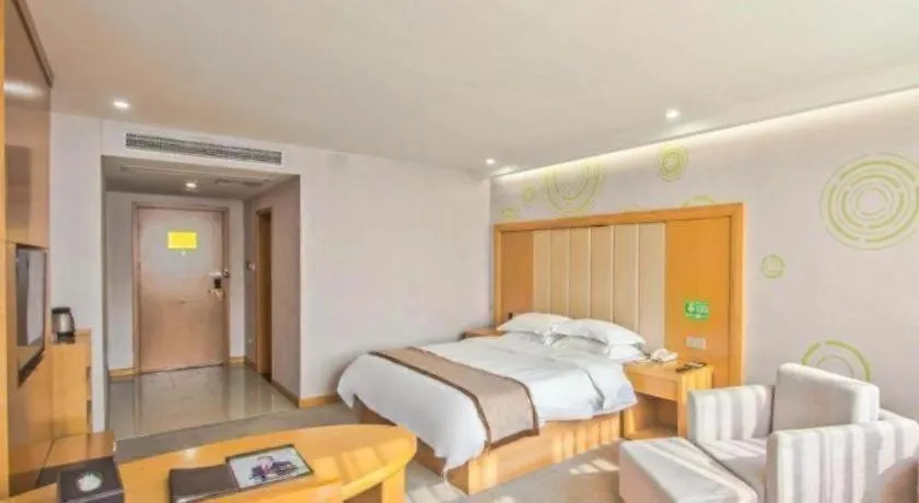 Bed in GreenTree Inn Tongxiang Chongfuzhen World Fur Center Branch