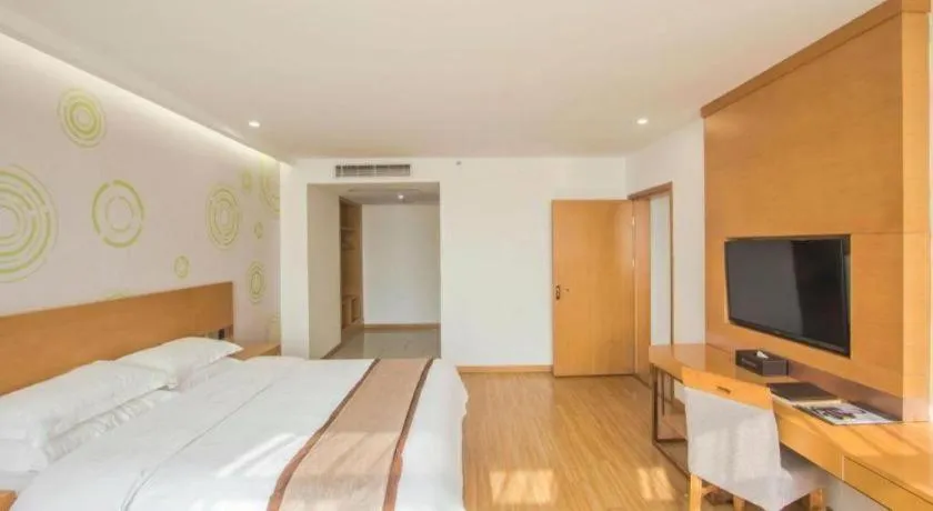 Bed in GreenTree Inn Tongxiang Chongfuzhen World Fur Center Branch
