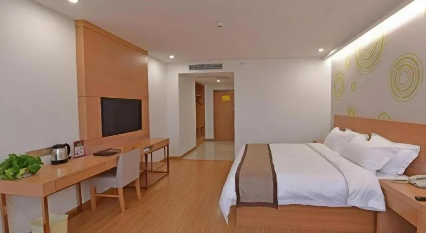 Bed in GreenTree Inn Tongxiang Chongfuzhen World Fur Center Branch