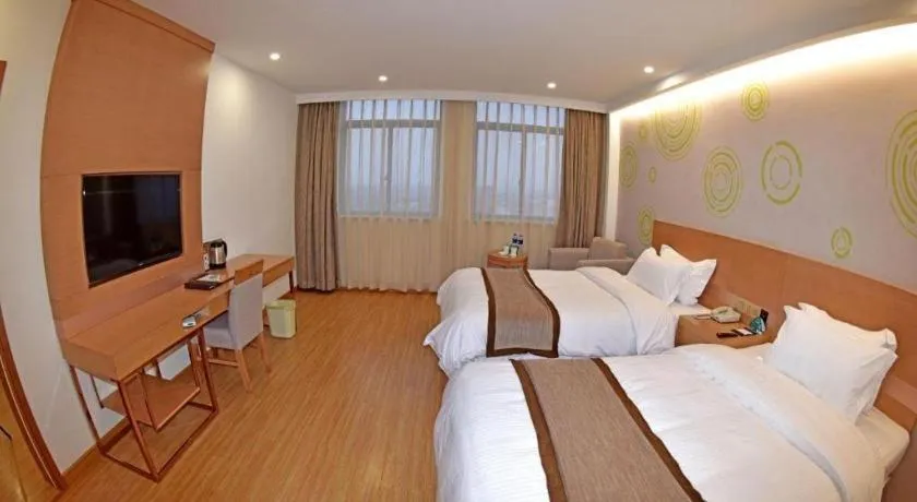 Bed in GreenTree Inn Tongxiang Chongfuzhen World Fur Center Branch