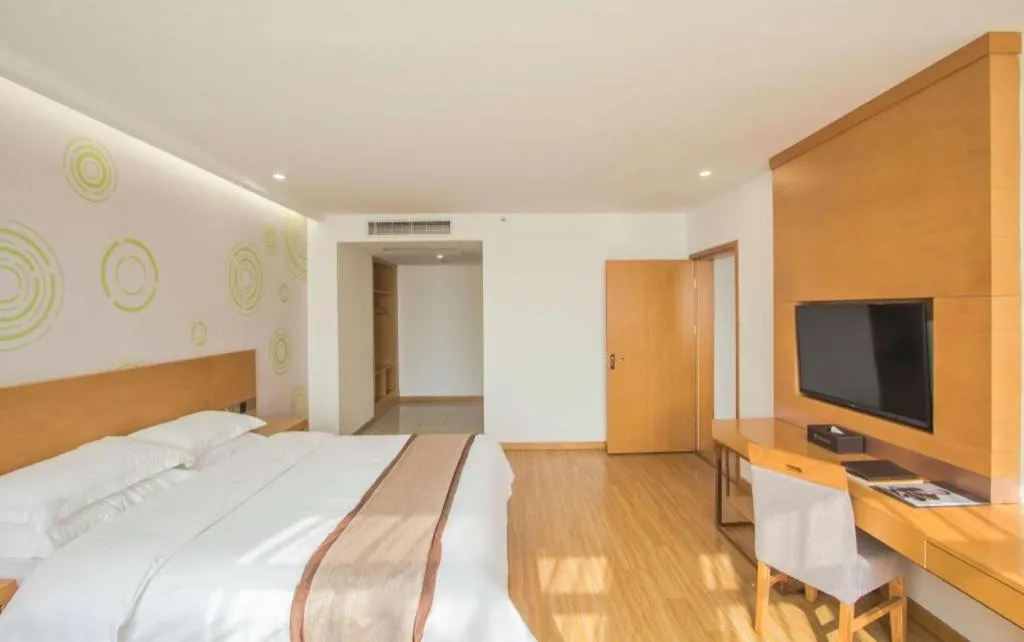 Bed in GreenTree Inn Tongxiang Chongfuzhen World Fur Center Branch