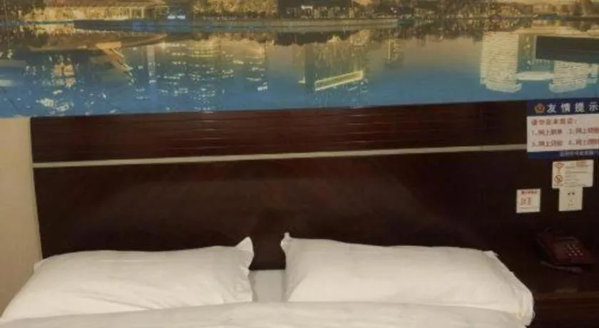 Bed in Shell Hotel Shanghai Baoshan Meilanhu Luosheng Road