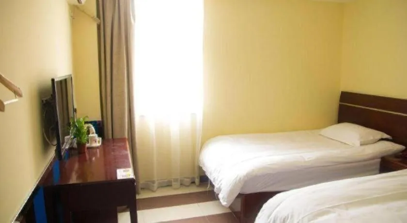 Bed in Shell Hotel Shanghai Baoshan Meilanhu Luosheng Road