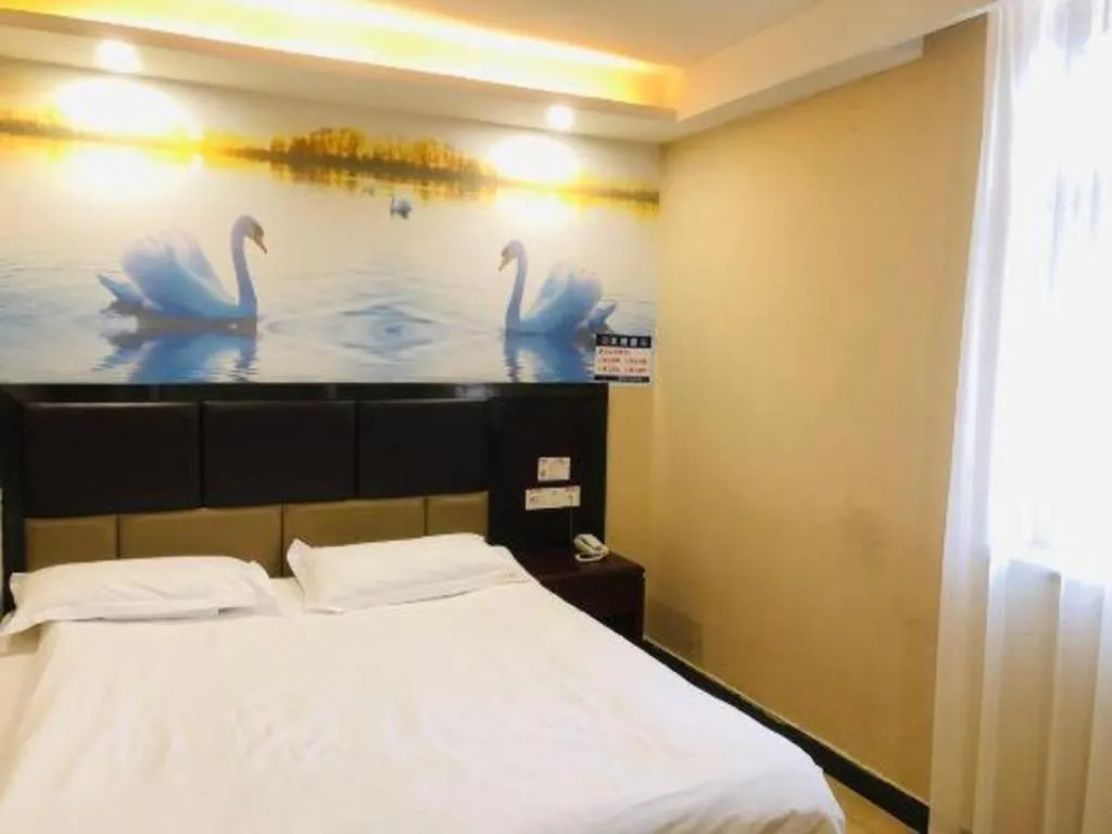 Bed in Shell Hotel Shanghai Baoshan Meilanhu Luosheng Road