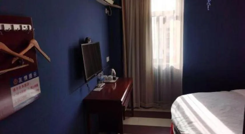 Bed in Shell Hotel Shanghai Baoshan Meilanhu Luosheng Road