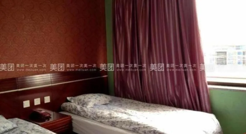 Bed in Shell Hotel Shanghai Baoshan Meilanhu Luosheng Road