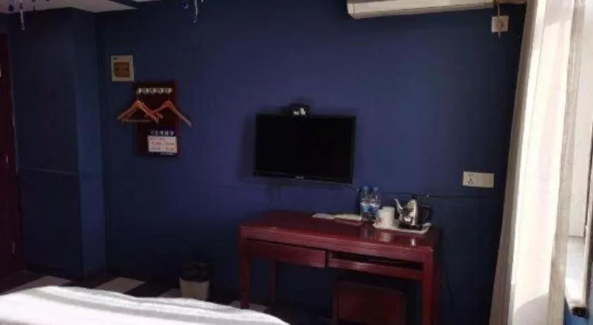 Bed in Shell Hotel Shanghai Baoshan Meilanhu Luosheng Road