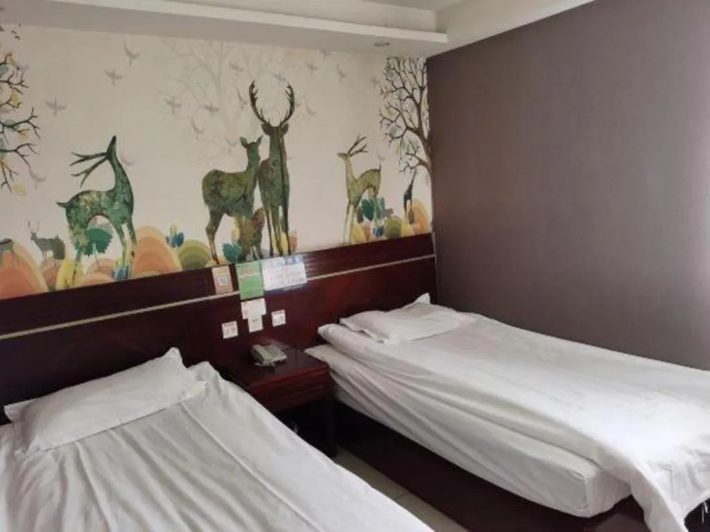 Bed in Shell Hotel Shanghai Baoshan Meilanhu Luosheng Road