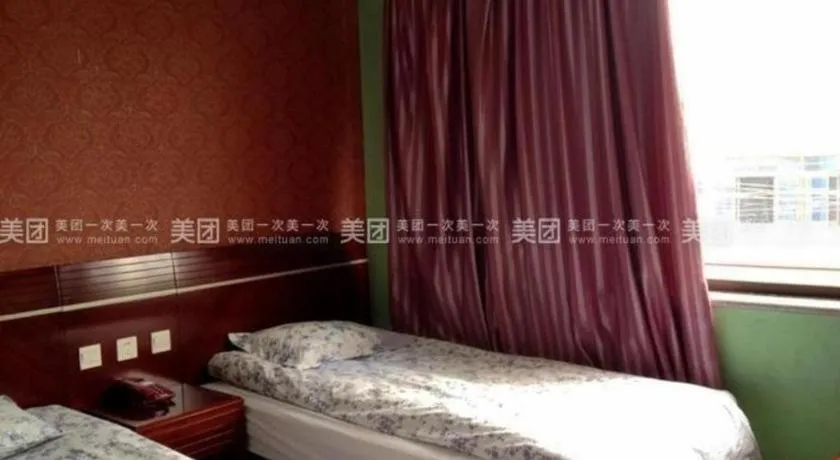 Bed in Shell Hotel Shanghai Baoshan Meilanhu Luosheng Road