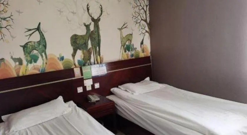 Bed in Shell Hotel Shanghai Baoshan Meilanhu Luosheng Road