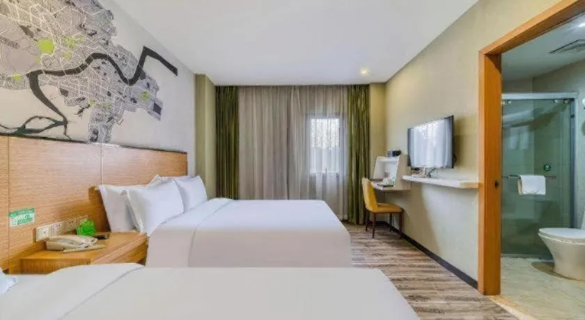 Bed in Vatica Hangzhou Xiasha Media College Hotel