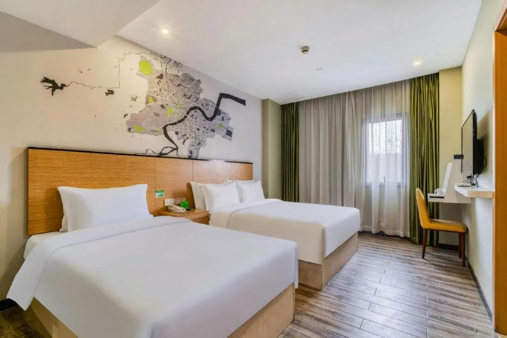 Bed in Vatica Hangzhou Xiasha Media College Hotel