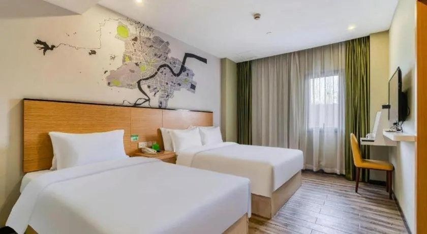 Bed in Vatica Hangzhou Xiasha Media College Hotel