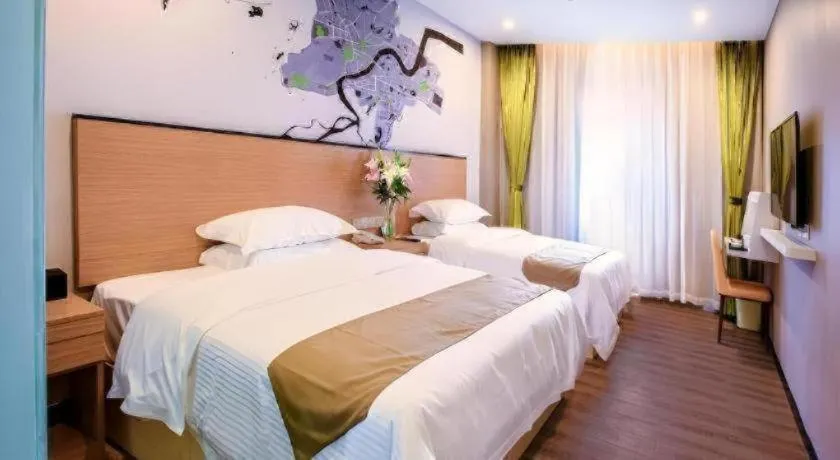 Bed in Vatica Hangzhou Xiasha Media College Hotel