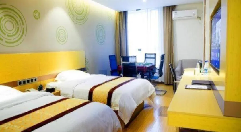 Bed in GreenTree Inn Huanggang City Wuxue City Kanjiang Avenue