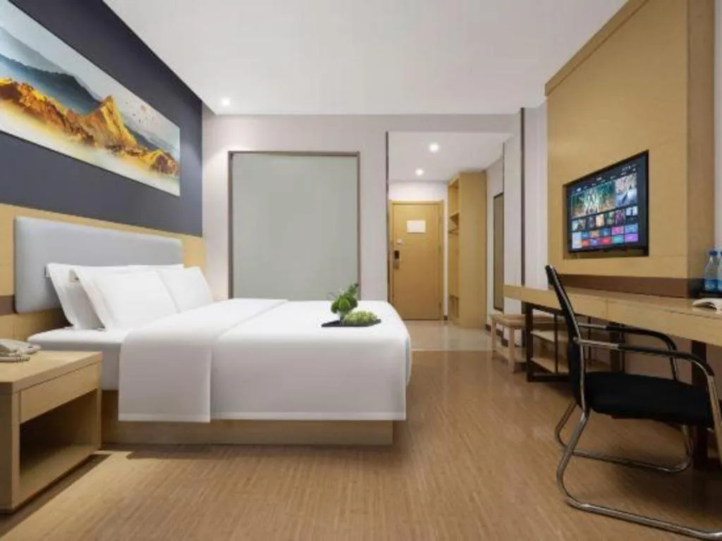 Bed in GreenTree Inn Huanggang City Wuxue City Kanjiang Avenue