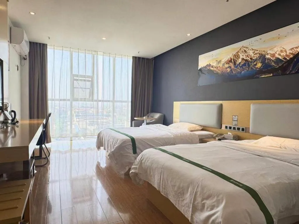 Bed in GreenTree Inn Huanggang City Wuxue City Kanjiang Avenue