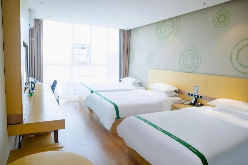 Bed in GreenTree Inn Huanggang City Wuxue City Kanjiang Avenue