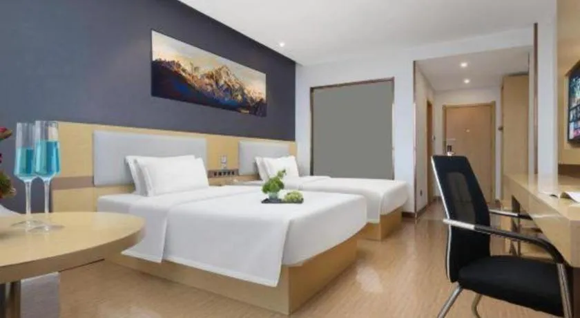 Bed in GreenTree Inn Huanggang City Wuxue City Kanjiang Avenue