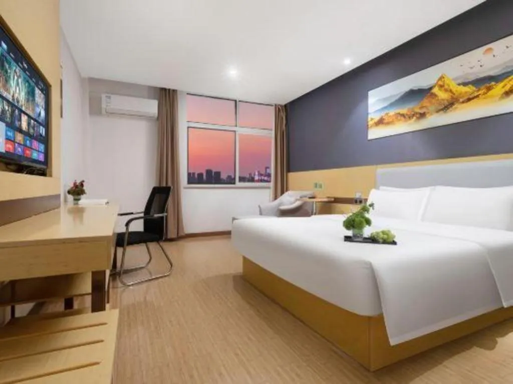 Bed in GreenTree Inn Huanggang City Wuxue City Kanjiang Avenue