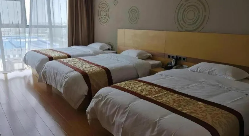 Bed in GreenTree Inn Huanggang City Wuxue City Kanjiang Avenue