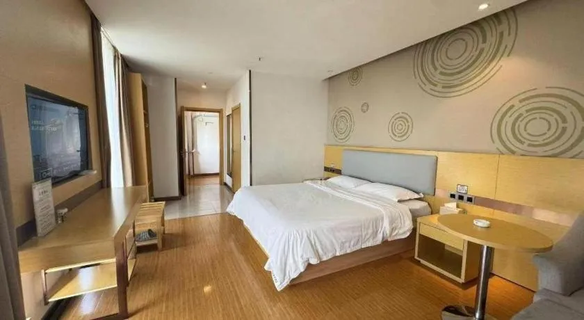 Bed in GreenTree Inn Huanggang City Wuxue City Kanjiang Avenue