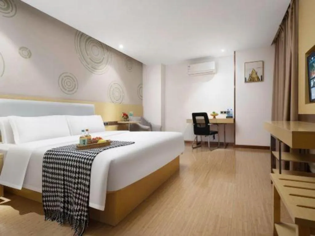 Bed in GreenTree Inn Huanggang City Wuxue City Kanjiang Avenue