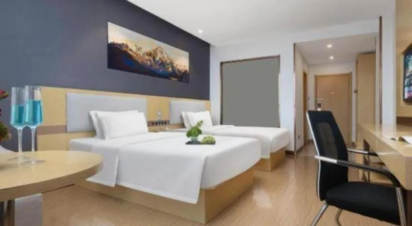 Bed in GreenTree Inn Huanggang City Wuxue City Kanjiang Avenue