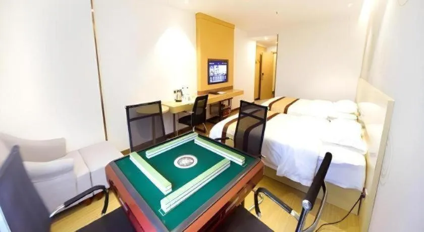 Bed in GreenTree Inn Huanggang City Wuxue City Kanjiang Avenue