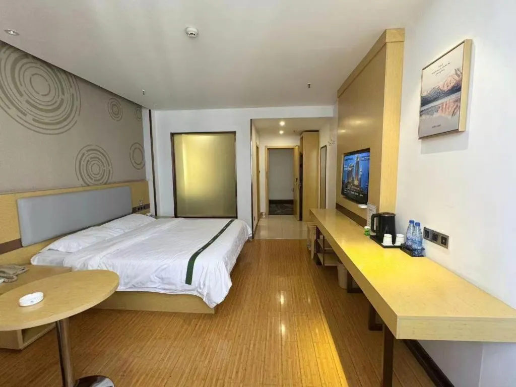 Bed in GreenTree Inn Huanggang City Wuxue City Kanjiang Avenue