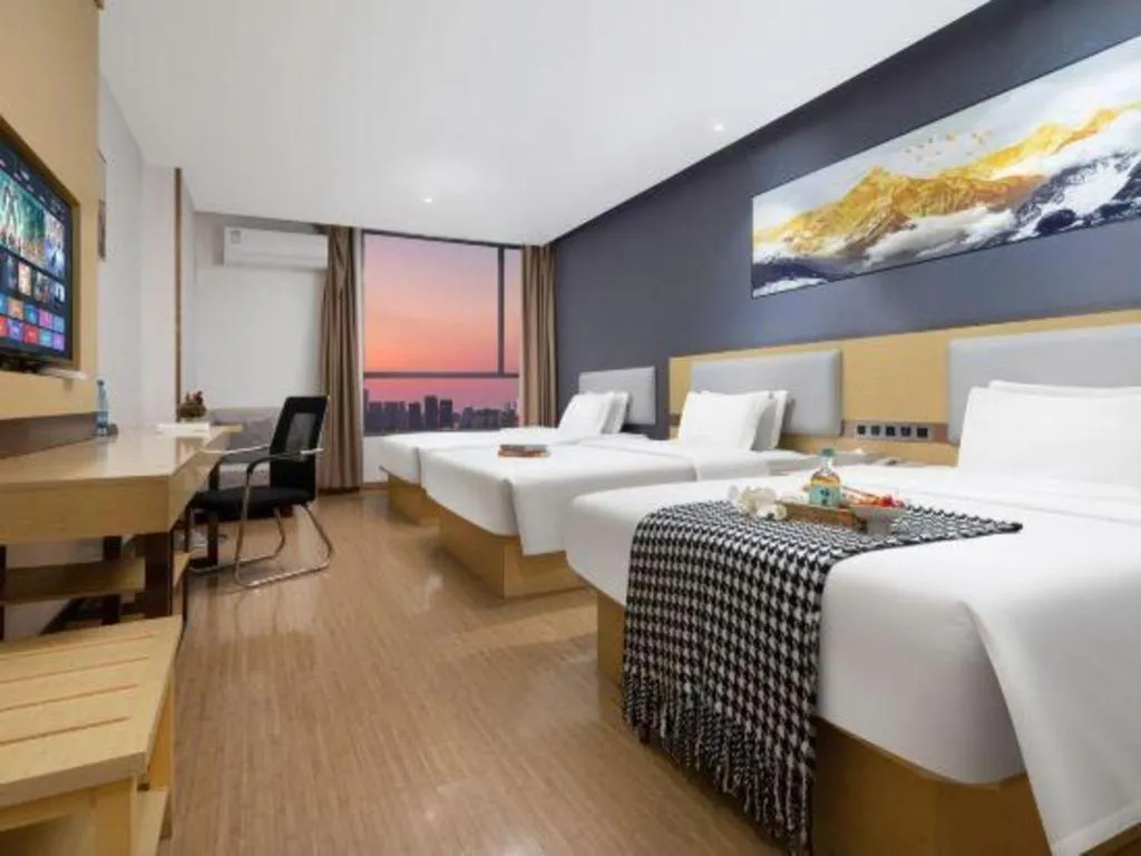 Bed in GreenTree Inn Huanggang City Wuxue City Kanjiang Avenue