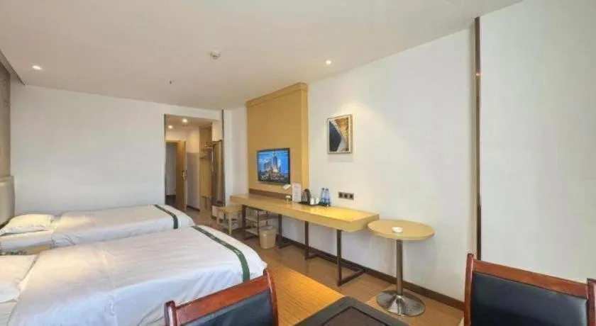 Bed in GreenTree Inn Huanggang City Wuxue City Kanjiang Avenue