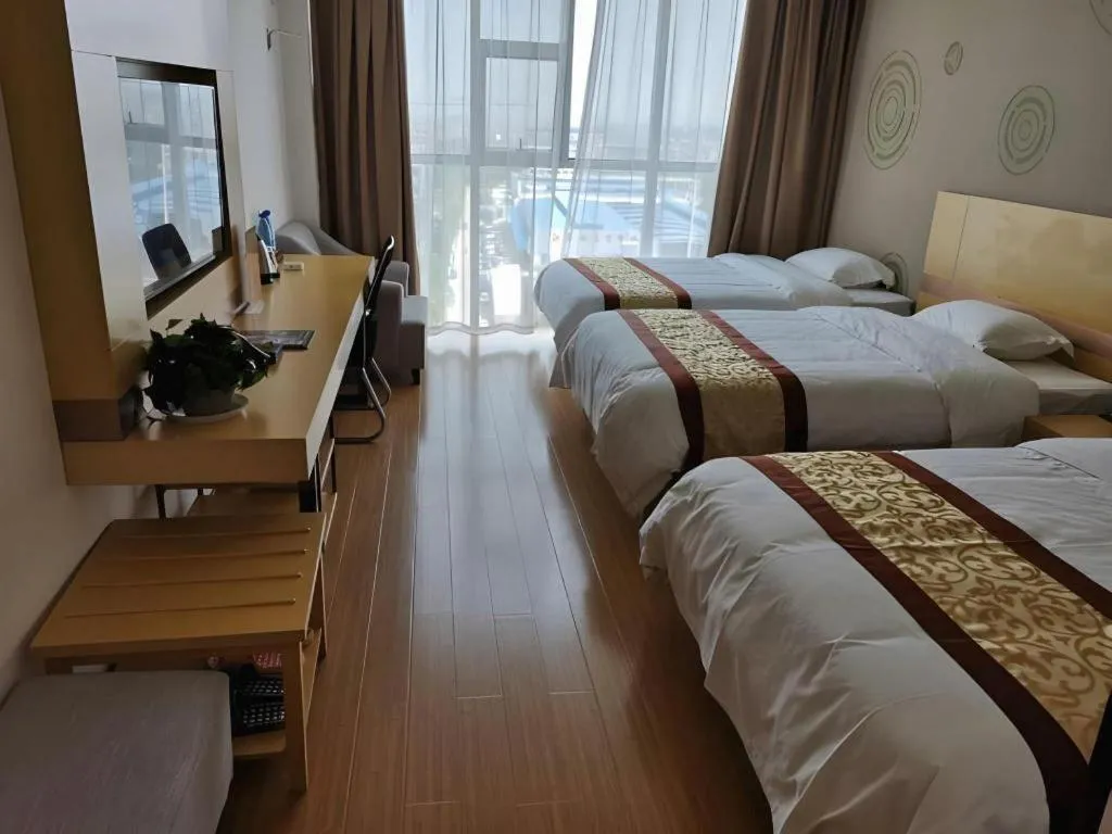 Bed in GreenTree Inn Huanggang City Wuxue City Kanjiang Avenue