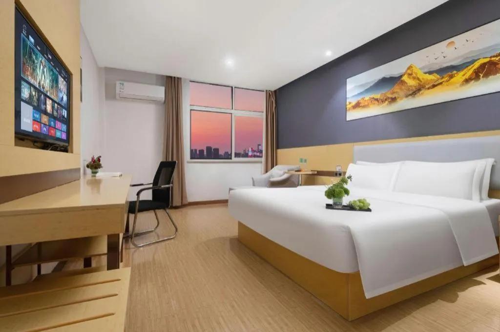 Bed in GreenTree Inn Huanggang City Wuxue City Kanjiang Avenue