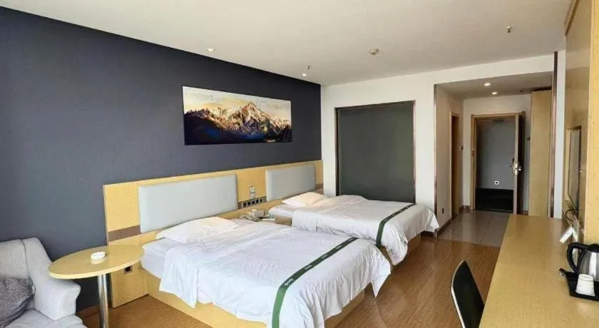 Bed in GreenTree Inn Huanggang City Wuxue City Kanjiang Avenue