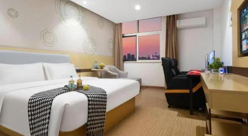 Bed in GreenTree Inn Huanggang City Wuxue City Kanjiang Avenue