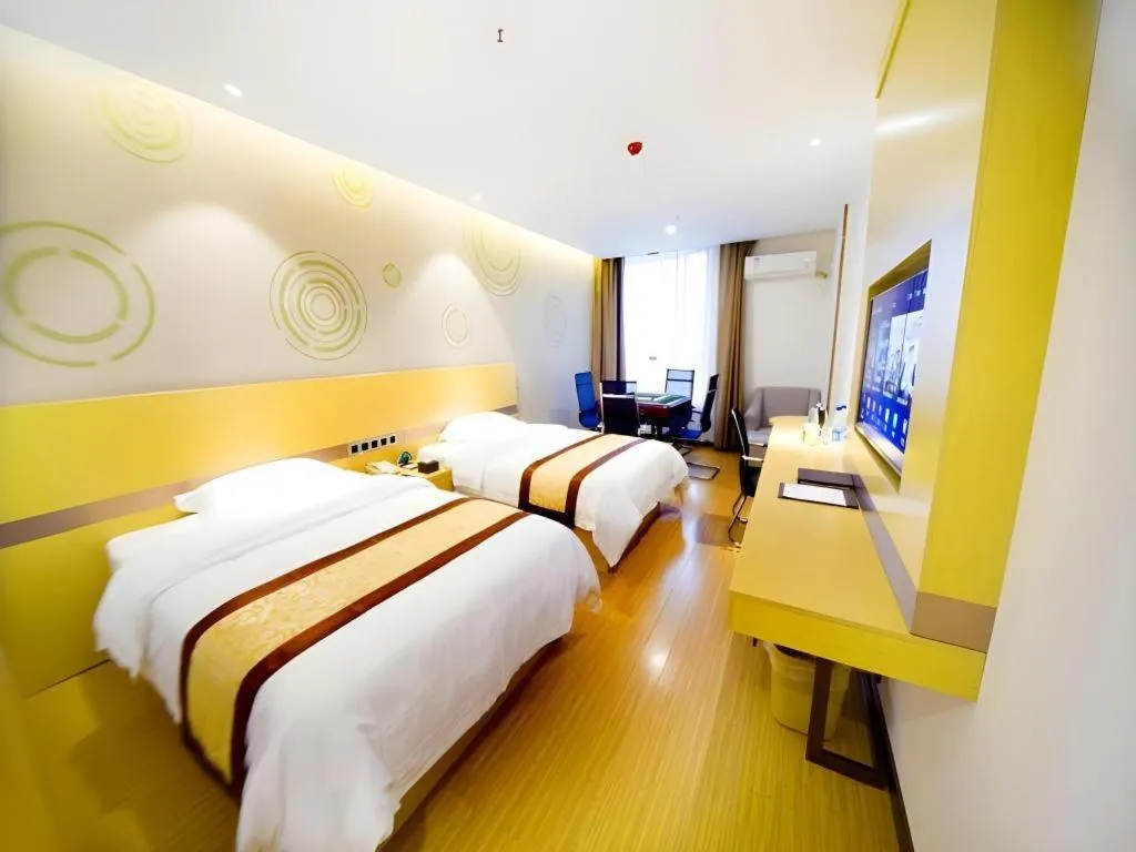 Bed in GreenTree Inn Huanggang City Wuxue City Kanjiang Avenue