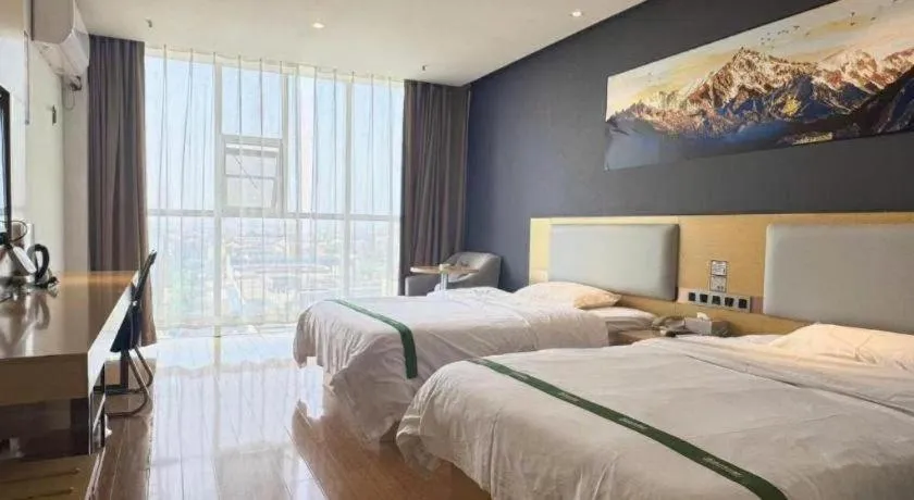 Bed in GreenTree Inn Huanggang City Wuxue City Kanjiang Avenue
