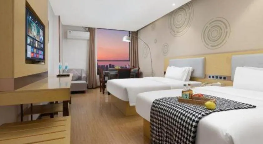 Bed in GreenTree Inn Huanggang City Wuxue City Kanjiang Avenue