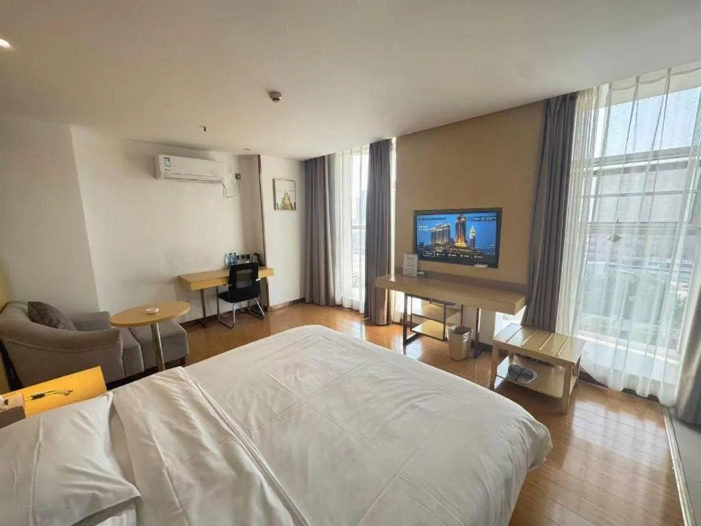 Bed in GreenTree Inn Huanggang City Wuxue City Kanjiang Avenue