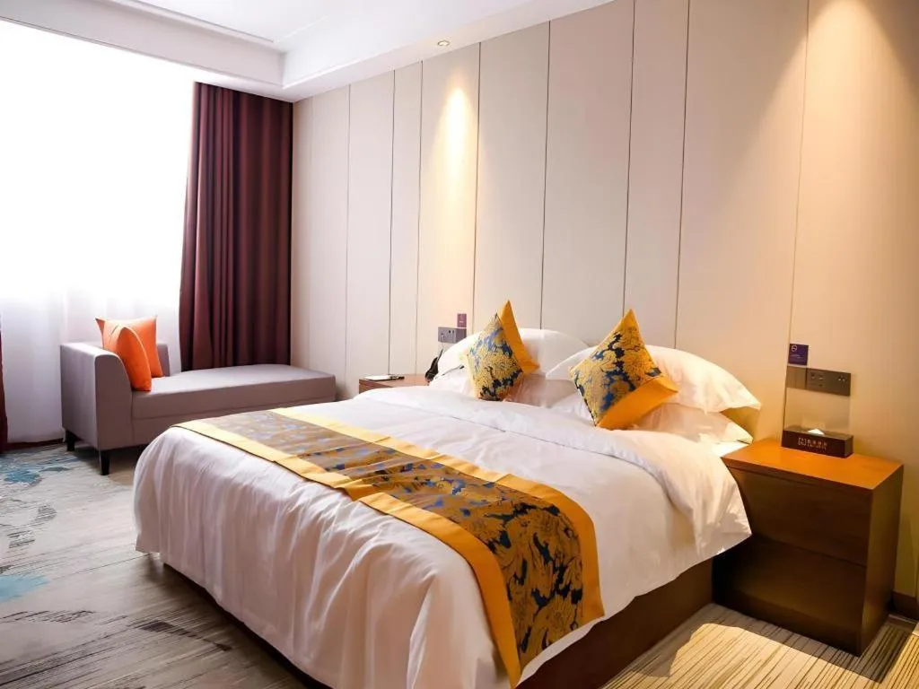 Bed in GME Taizhou Jingjiang City Bus Station Hotel
