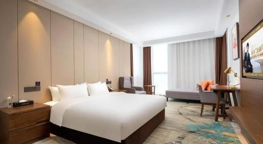 Bed in GME Taizhou Jingjiang City Bus Station Hotel