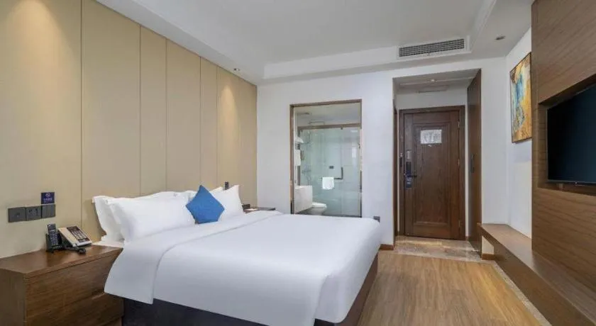 Bed in GME Taizhou Jingjiang City Bus Station Hotel