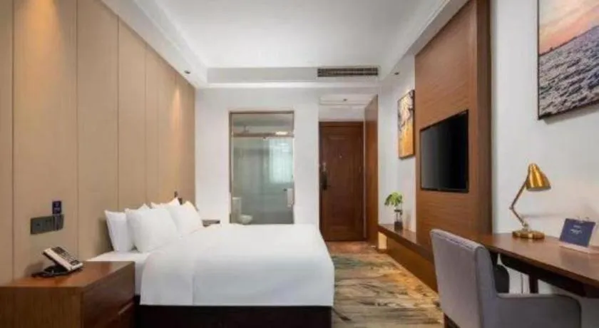 Bed in GME Taizhou Jingjiang City Bus Station Hotel