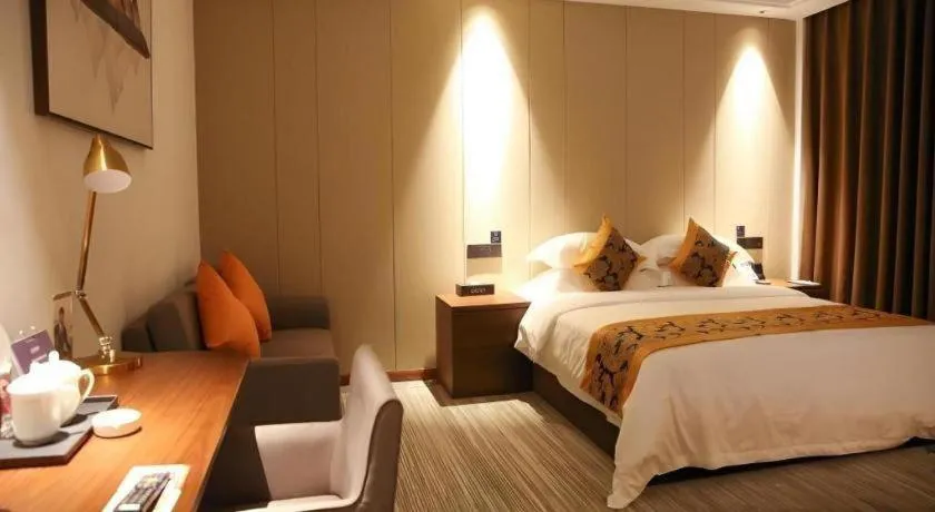 Bed in GME Taizhou Jingjiang City Bus Station Hotel