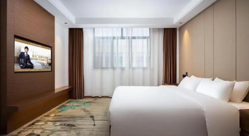 Bed in GME Taizhou Jingjiang City Bus Station Hotel