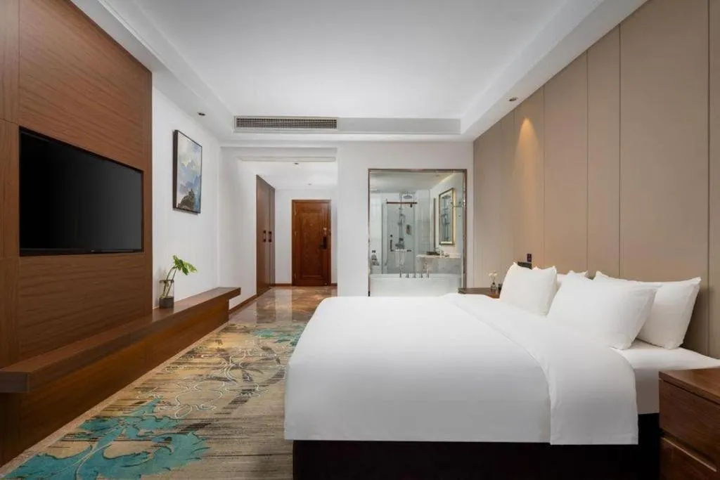 Bed in GME Taizhou Jingjiang City Bus Station Hotel