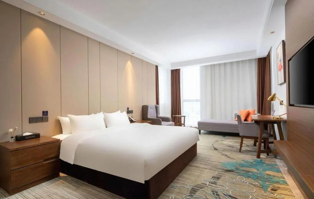 Bed in GME Taizhou Jingjiang City Bus Station Hotel