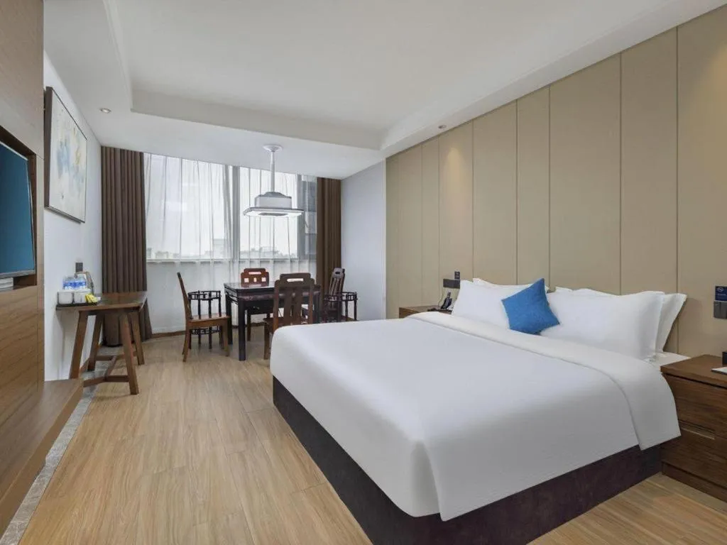 Bed in GME Taizhou Jingjiang City Bus Station Hotel