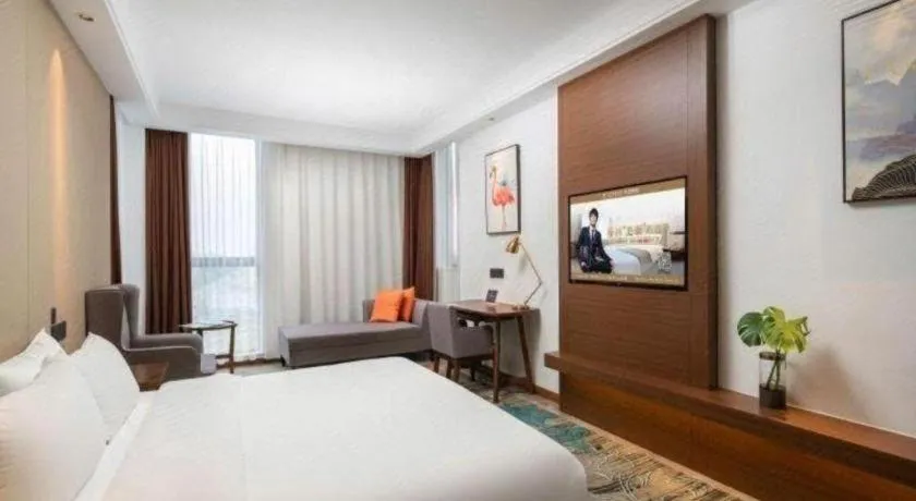 Bed in GME Taizhou Jingjiang City Bus Station Hotel